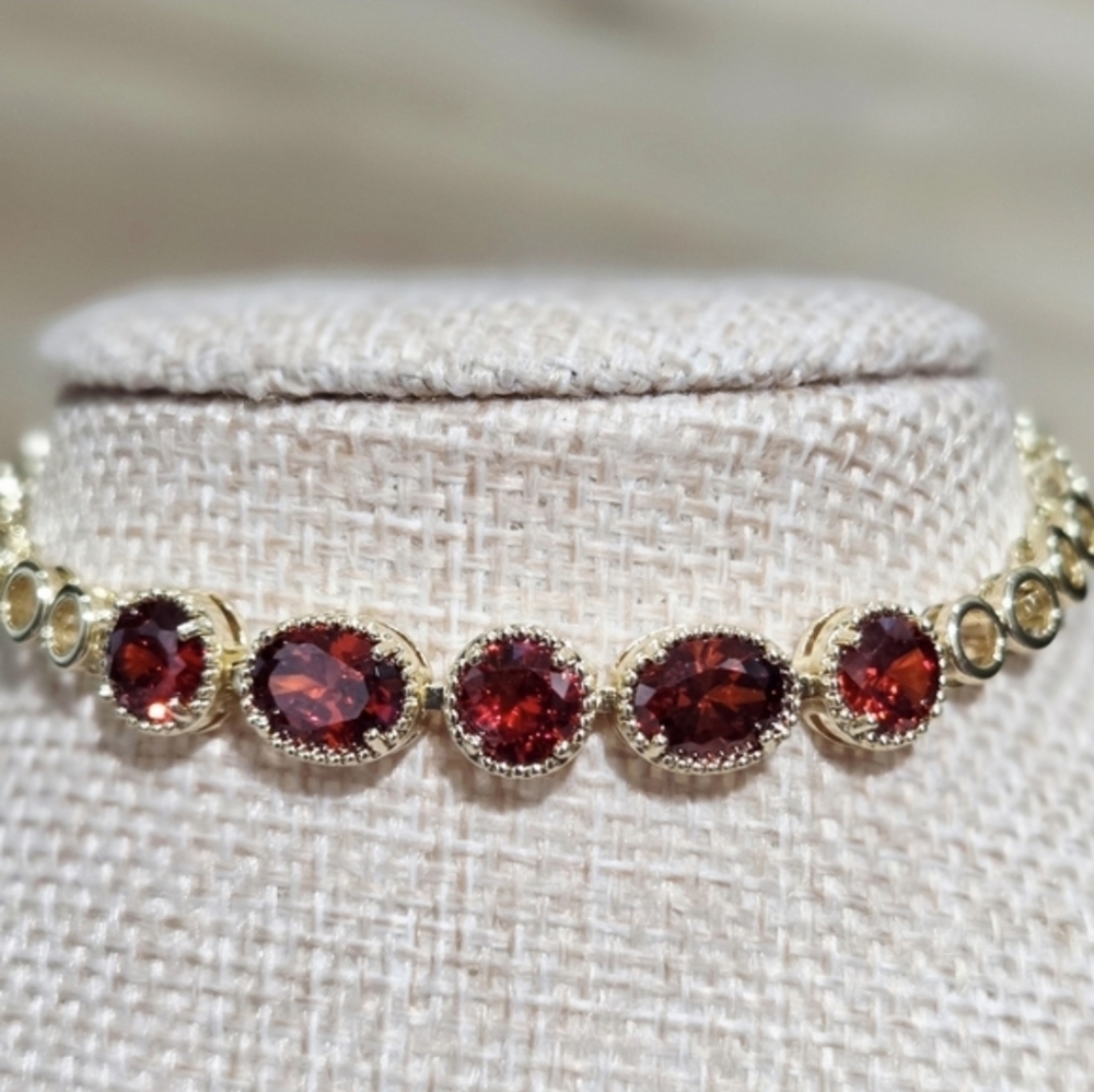 Elegant Gold and Red Gemstone Bracelet